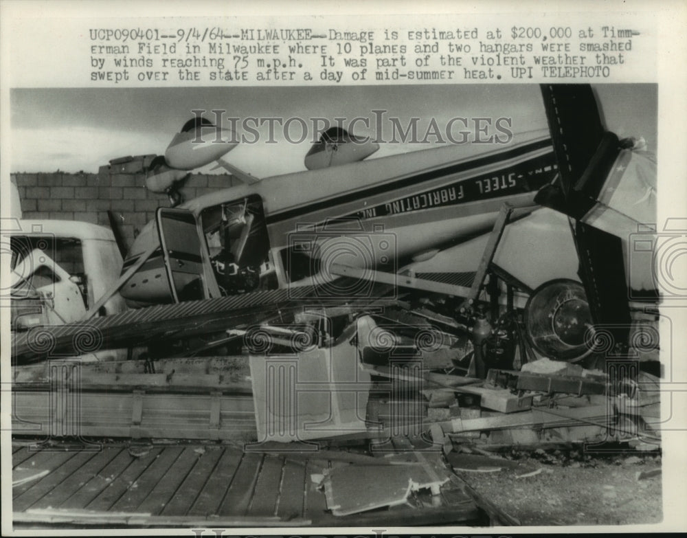 1964, Planes damaged at Timmerman Field during storm in Milwaukee - Historic Images