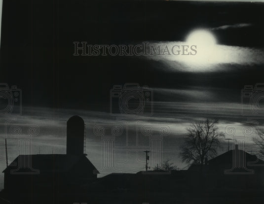 1977 Sun sets in Green Lake County farm, south of Markesan - Historic Images