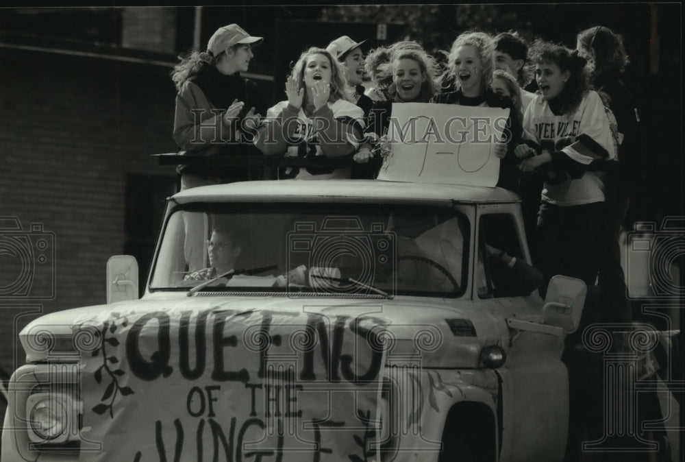 1993, Volleyball team in homecoming parade, Spring Green, Wisconsin - Historic Images