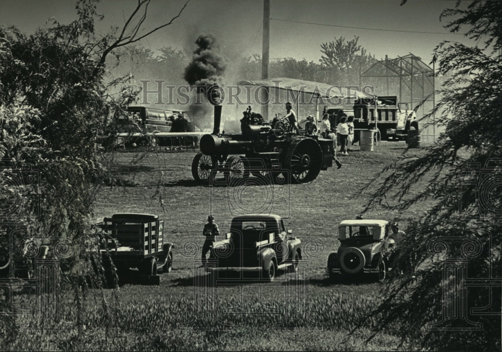 1987, Paul Garity drove a Case Traction Engine in Sussex, Wisconsin - Historic Images