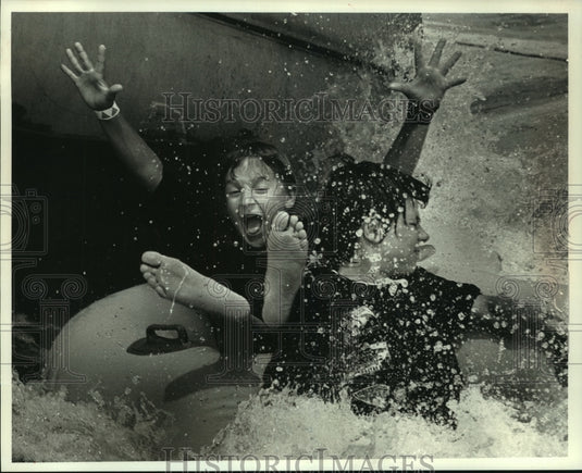 1990, Matt Hickman & Jonathan Dlugi splash down at Surf 'n Turf park - Historic Images