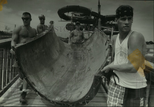 1994, Rainbow Falls lifeguards dismantle Surf 'n Water Park flumes - Historic Images