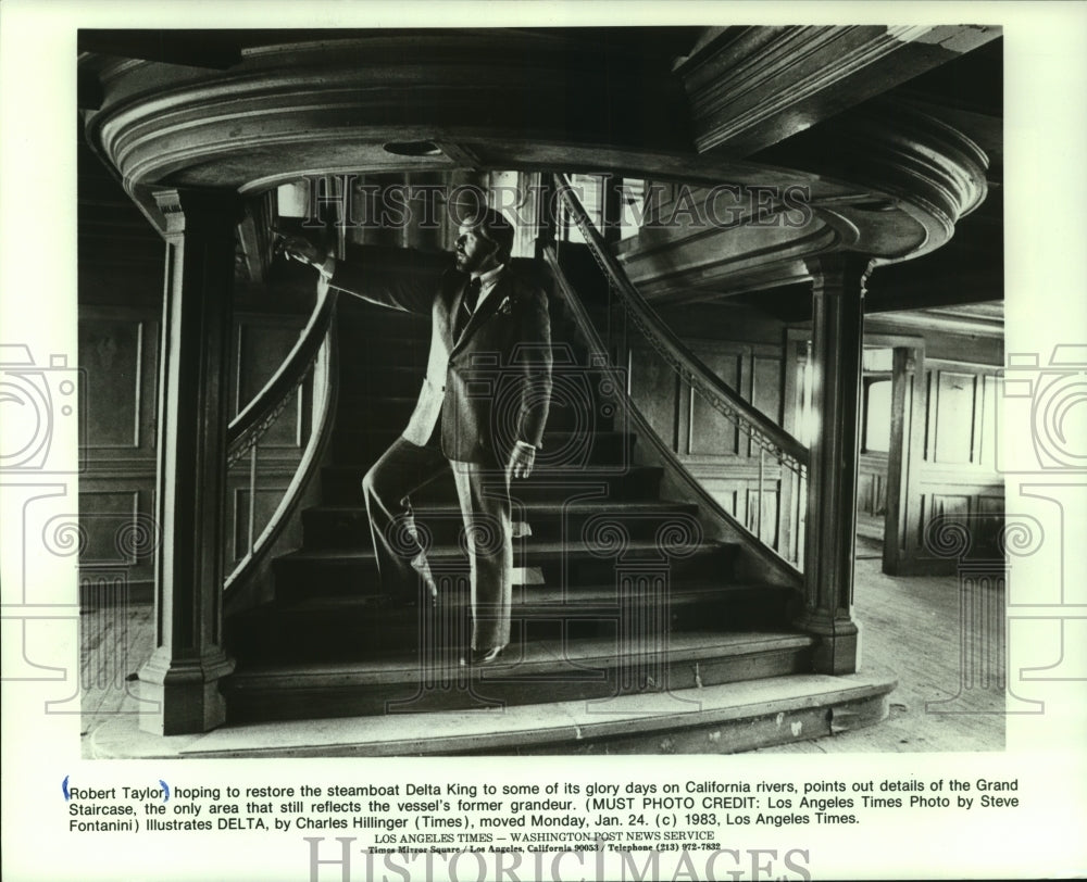 1983, Robert Taylor on the staircase of the Delta King steamboat - Historic Images