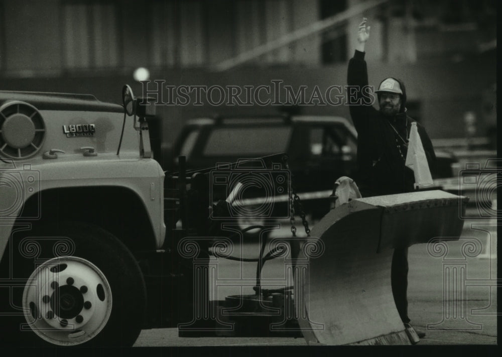 1994, Mark Kobelinski, directs snowplow rodeo drivers, Wisconsin - Historic Images