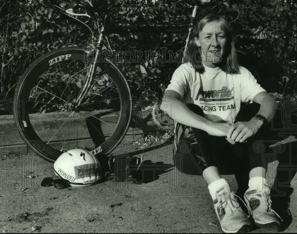 1993 Eileen Sherburne sits in front of her bike, Milwaukee - Historic Images