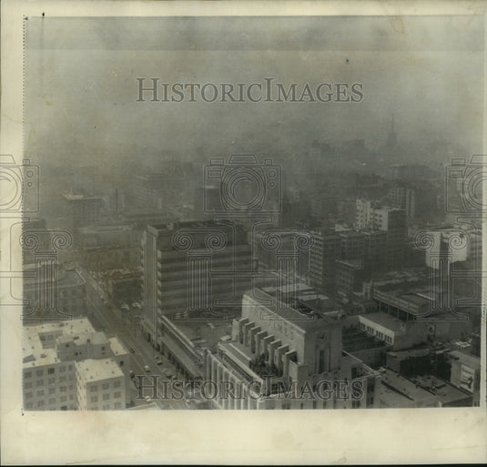 1955, Aerial view of the smog covering Los Angeles, California - Historic Images