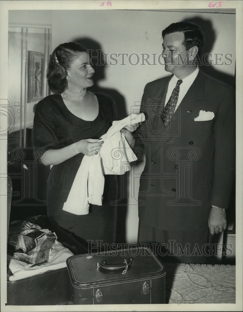 1952, Governor and Mrs. Herman Talmadge unpack bags at Congress Hotel - Historic Images