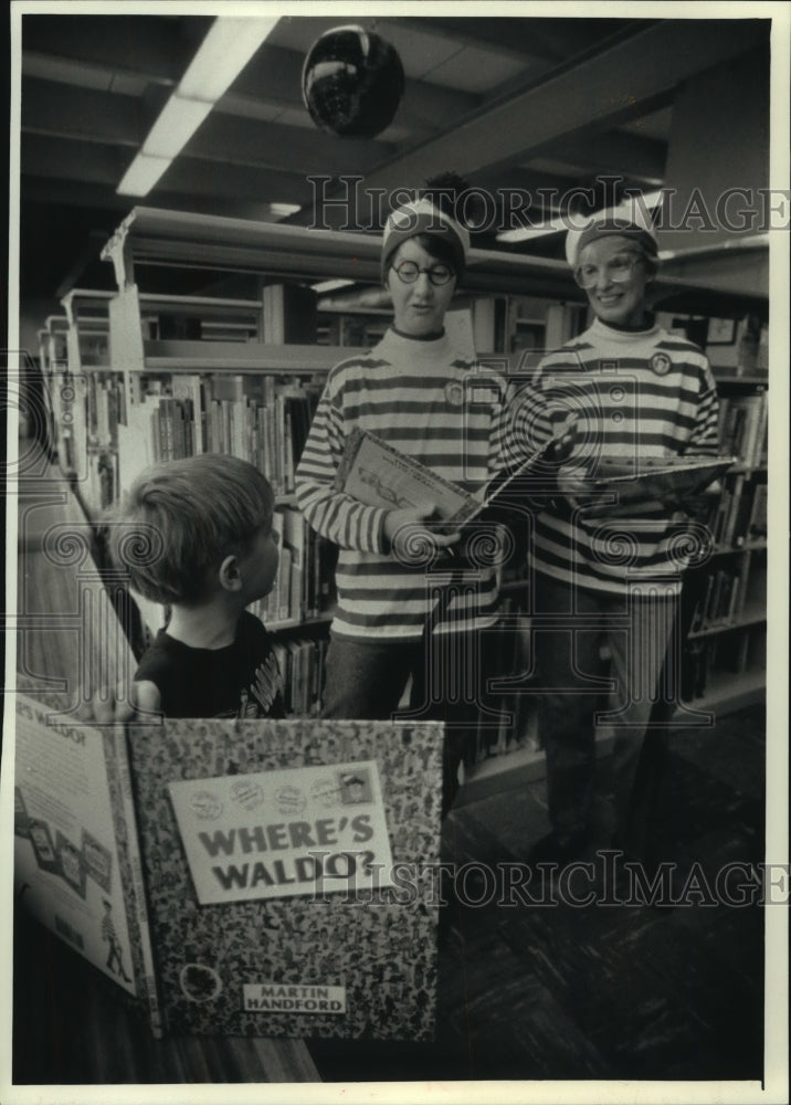 1991, Kathy Brockett and Joy Botts dress up as &quot;Waldo&quot;, Sussex - Historic Images