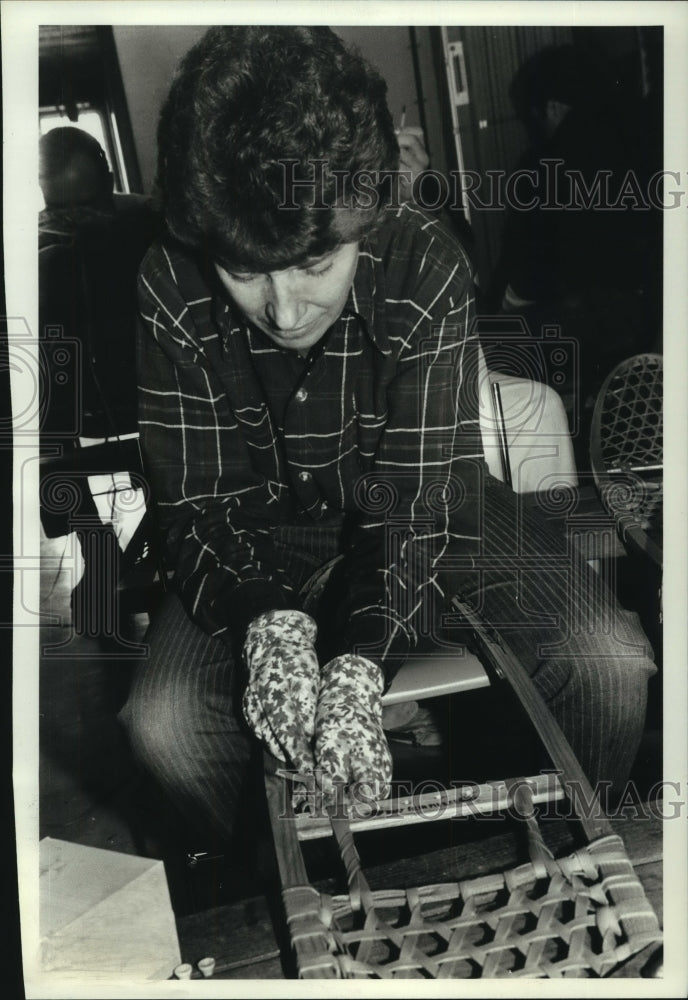 1993, Mary Pierce, works on snowshoes during class at Nature Center. - Historic Images