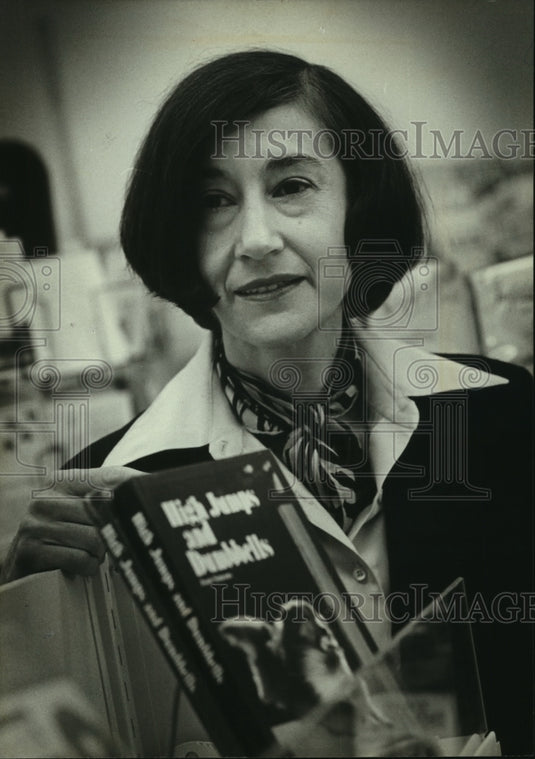 1980 Joan Simons, Wauwatosa, with her book::High Jumps and Dumbbells - Historic Images