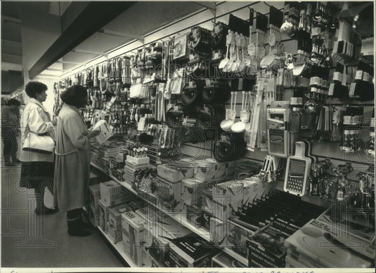 1990 Shoppers at T.J. Maxx store, new cookware department - Historic Images