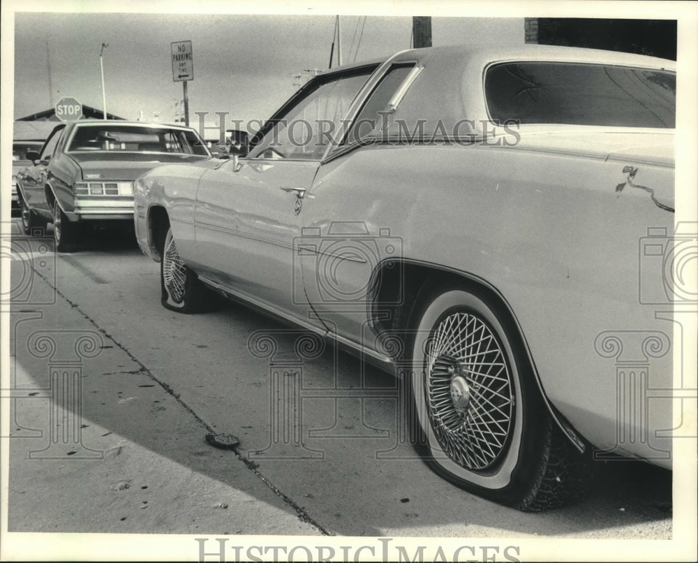 1985, Car vandalized while parked near Crestwood Bakery during strike - Historic Images