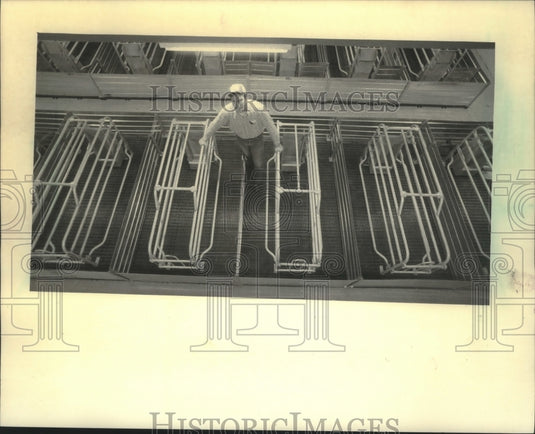 1983, Duane Gangwish, shows off high-tech environment, Wisconsin. - Historic Images