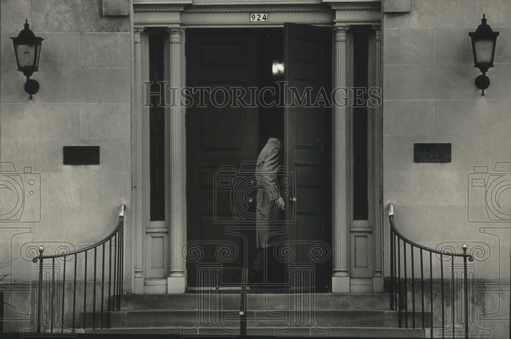 1991, Man enters University Club, Milwaukee Wisconsin - mjc14885 - Historic Images