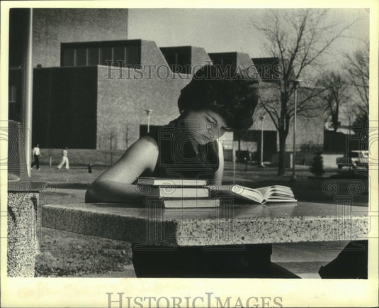 1980, University of Wisconsin-Superior's Arts building behind student - Historic Images