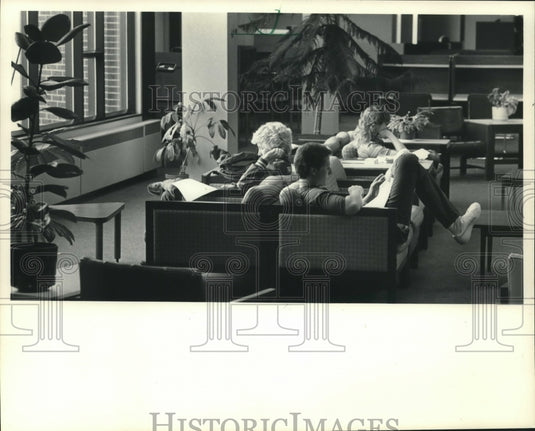 1983, University of Wisconsin students study for final exams - Historic Images