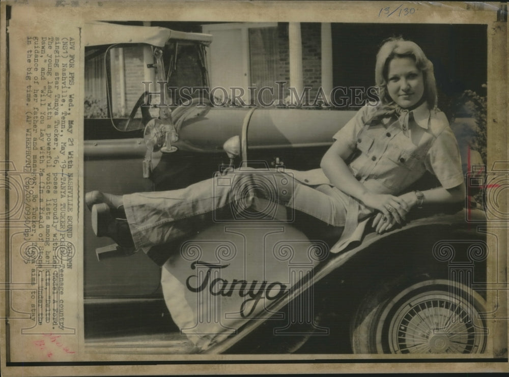 1975 Press Photo Tanya Tucker, teenage country singing star with Model A Ford - Historic Images