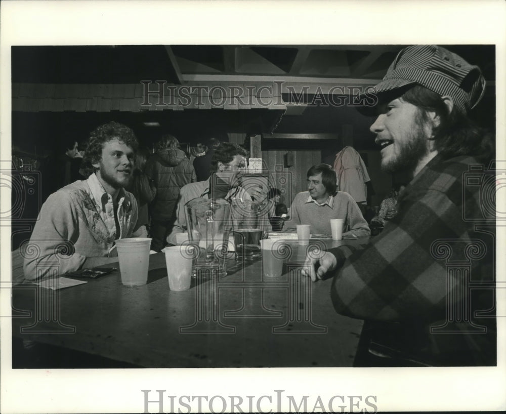 1977, UWM students and professors have drinks at the Gasthaus - Historic Images