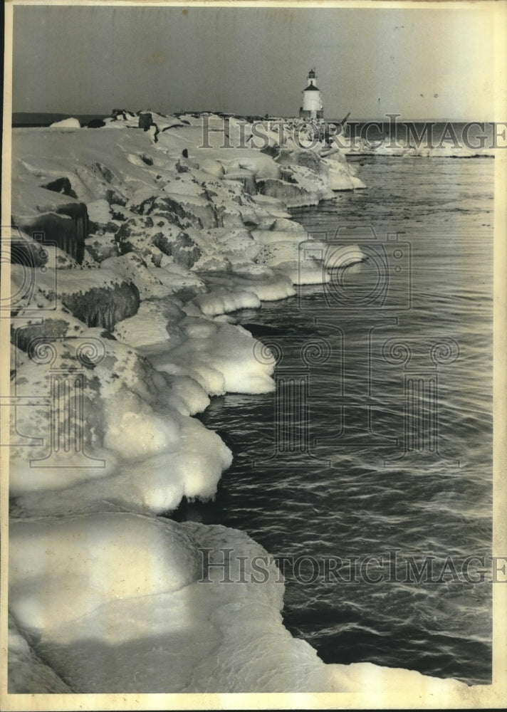 1983, Ice formations along breakwater near Lake Superior lighthouse - Historic Images
