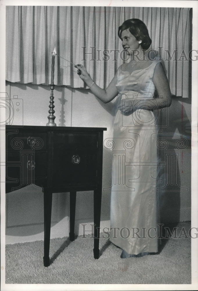 1963, Mrs. Kingston Swallow of Milwaukee models satin gown - Historic Images