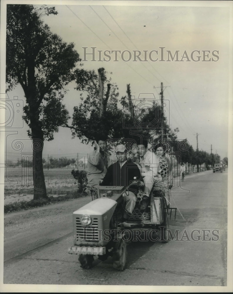 1959 Press Photo Group of People Riding Vehicle in Taiwan Street - mjc15473-Historic Images