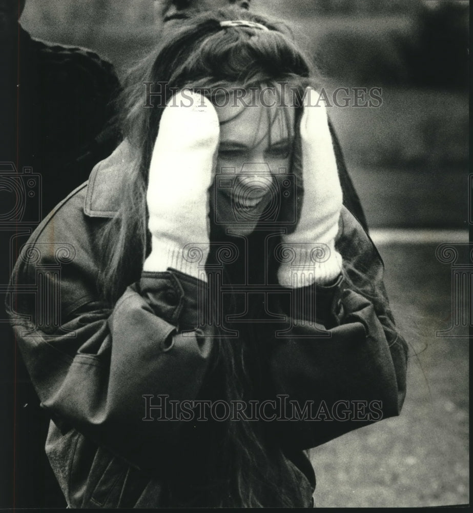 1992, Pamela Garside laughs as her egg splattered at UW - Waukesha - Historic Images