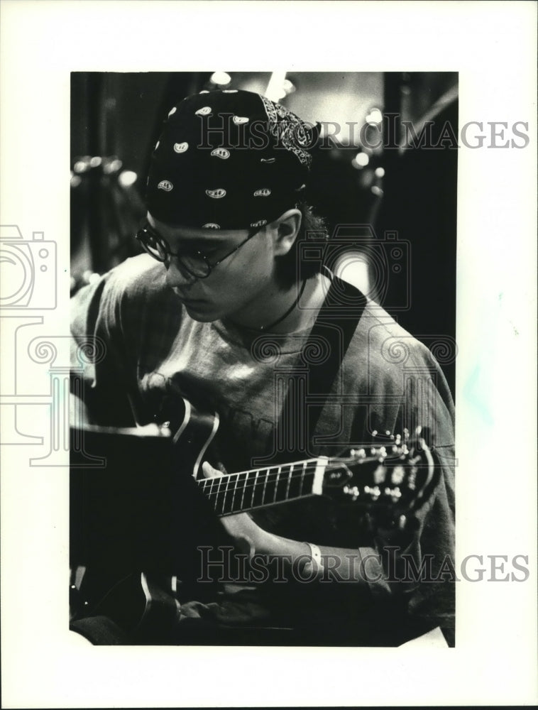 1992 Jason Goessl of Denmark hones musical skills at UW-Green Bay - Historic Images