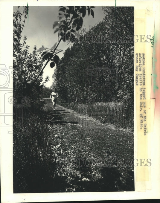 1983 Andrea Linstrom jogged at University of Wisconsin Green Bay - Historic Images