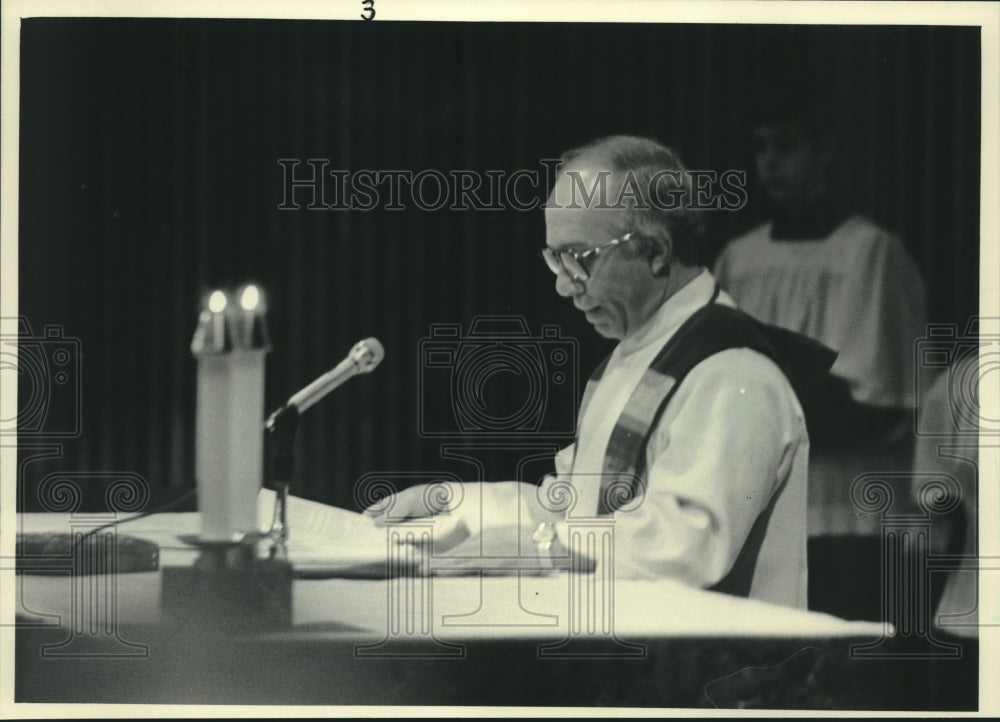 1983, Father Vincent Silvestri at Saint Dominic's Catholic Church - Historic Images
