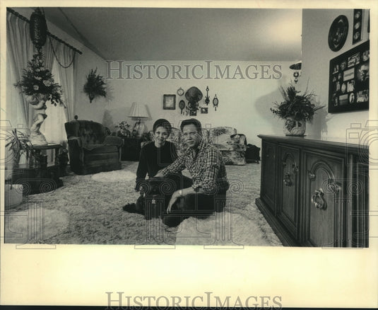 1983, Don Simmons trucker, wife, at home irked by union, Wisconsin - Historic Images