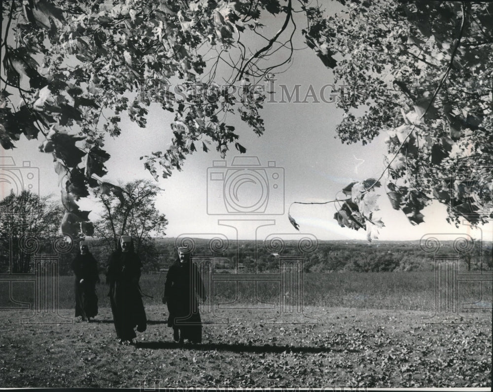 1963, Sisters of Misericorde discuss watershed section of land - Historic Images
