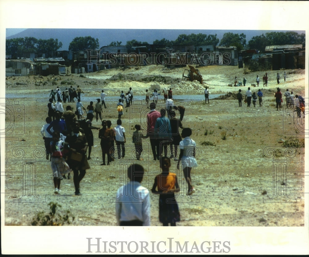 1993, Students from Noxolo School near Cape Town So Africa walk home - Historic Images