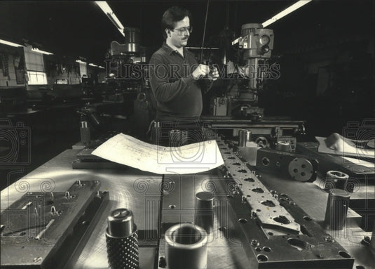1992, Ken Singer inspects a part at Singer Tool & Die - mjc16073 - Historic Images