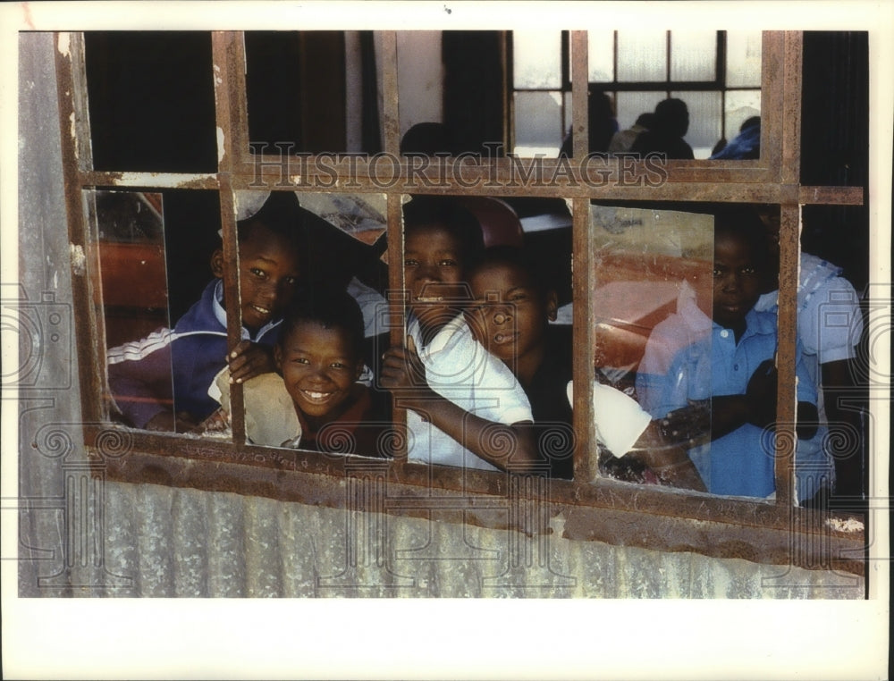 1993, Noxoio School students greet visitors, South Africa - mjc16090 - Historic Images