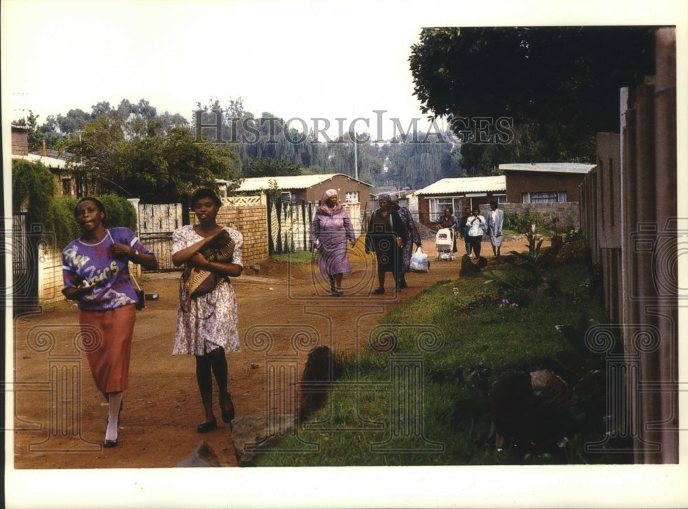 1993, Churchgoers waling to St. Pius Catholic Church, Soweto, Africa - Historic Images