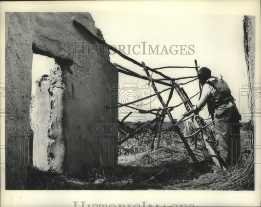 1968, Man in Cape Town, South Africa, breaks down his home to rebuild - Historic Images