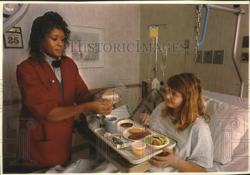 1994 Myrna Word serves patient lunch Sinai Samaritan Medical Center - Historic Images