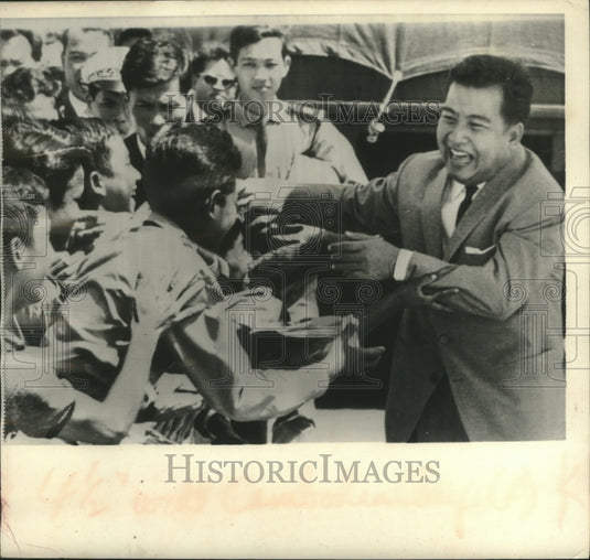 1964, Prince Norodom Sihanouk was greeted at Pnompenh airport - Historic Images