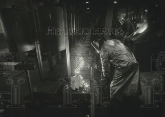 1993, Workers pour iron at Signicast manufacturing facility, Hartford - Historic Images