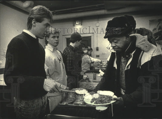 1988, Notre Dame students served food at St. Gall church in Milwaukee - Historic Images