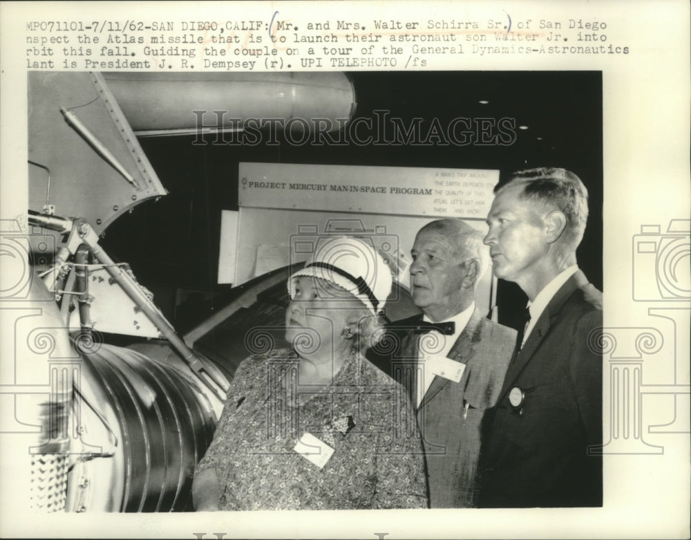 1962, Walter Schirra Sr. &amp; wife inspect Atlas missile, California - Historic Images
