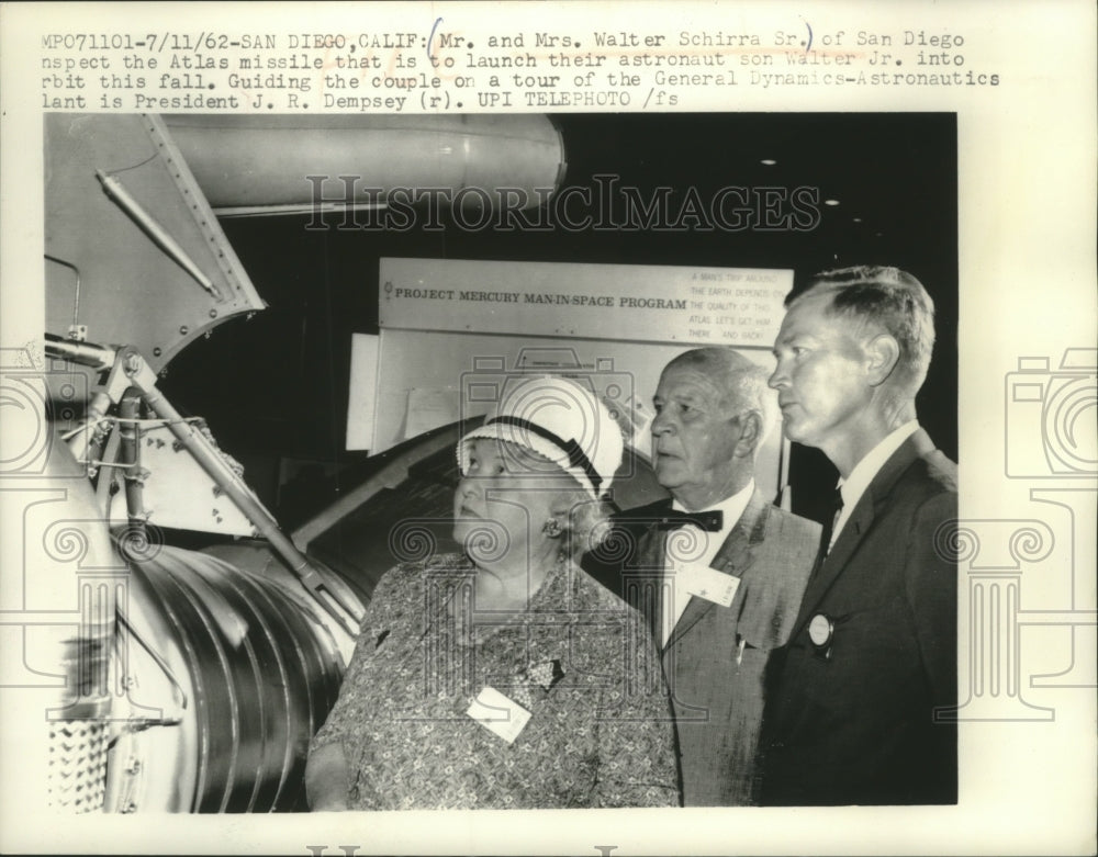 1962, Walter Schirra Sr. & wife inspect Atlas missile, California - Historic Images