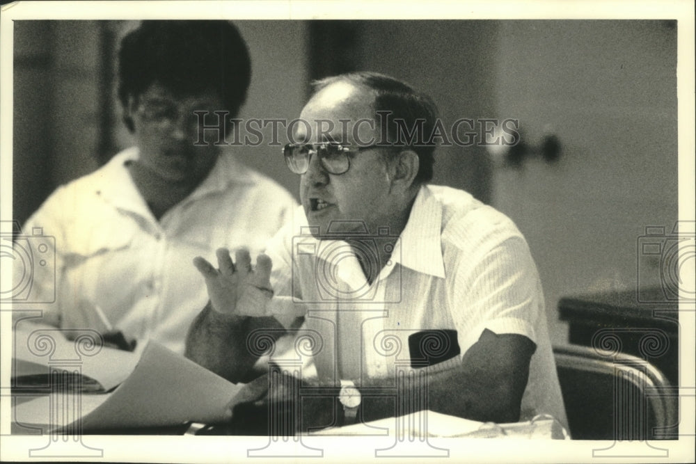 1991 Gordon Scheunemann, Nashotah Village President, at a meeting-Historic Images