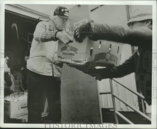 1988, Tom Schiltz, St. Joseph's Food Program unloads food, Appleton - Historic Images