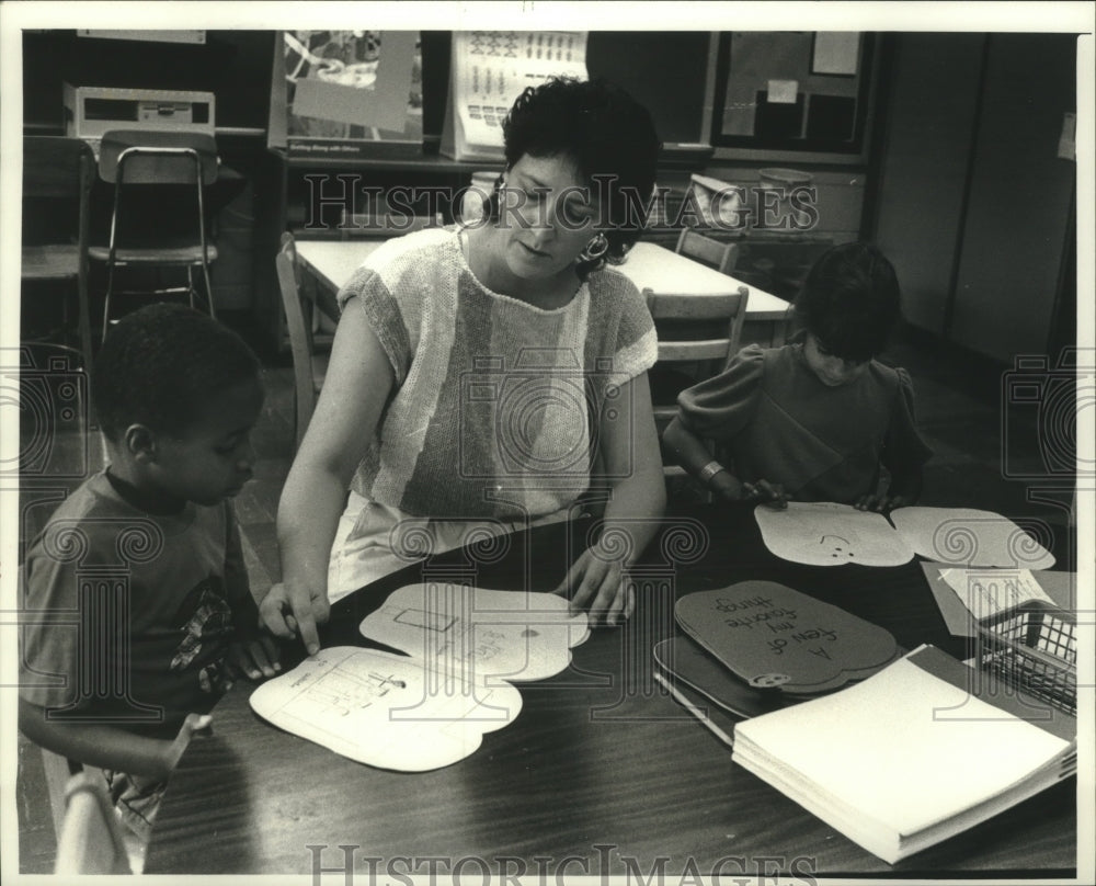 1989, Teacher, Peggy Holtman with students, Sixty-Fifth Street School - Historic Images