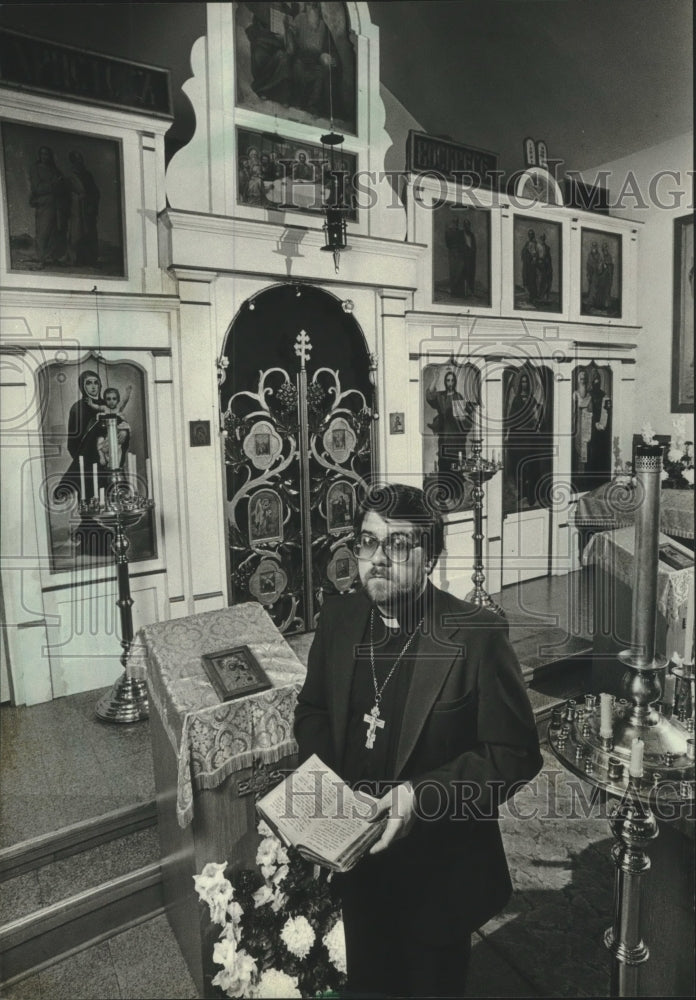 1981, Father Simeon in front of alter SS. Cyril and Methodius Church - Historic Images