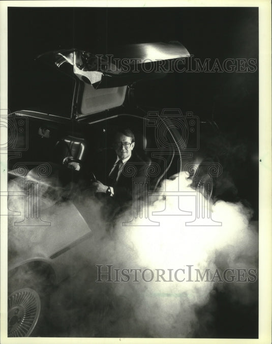 1990, Richard Sim, Chief Executive, Applied Power Inc, in car - Historic Images