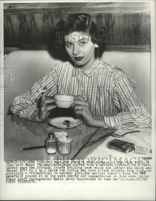 1953, Pat Ward sips coffee in New York restaurant near court - Historic Images
