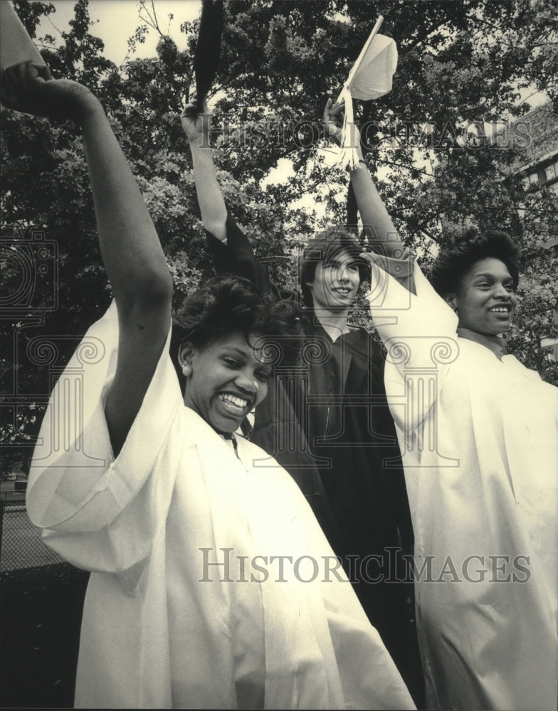1984, High School graduates celebrate at commencement exercises. - Historic Images