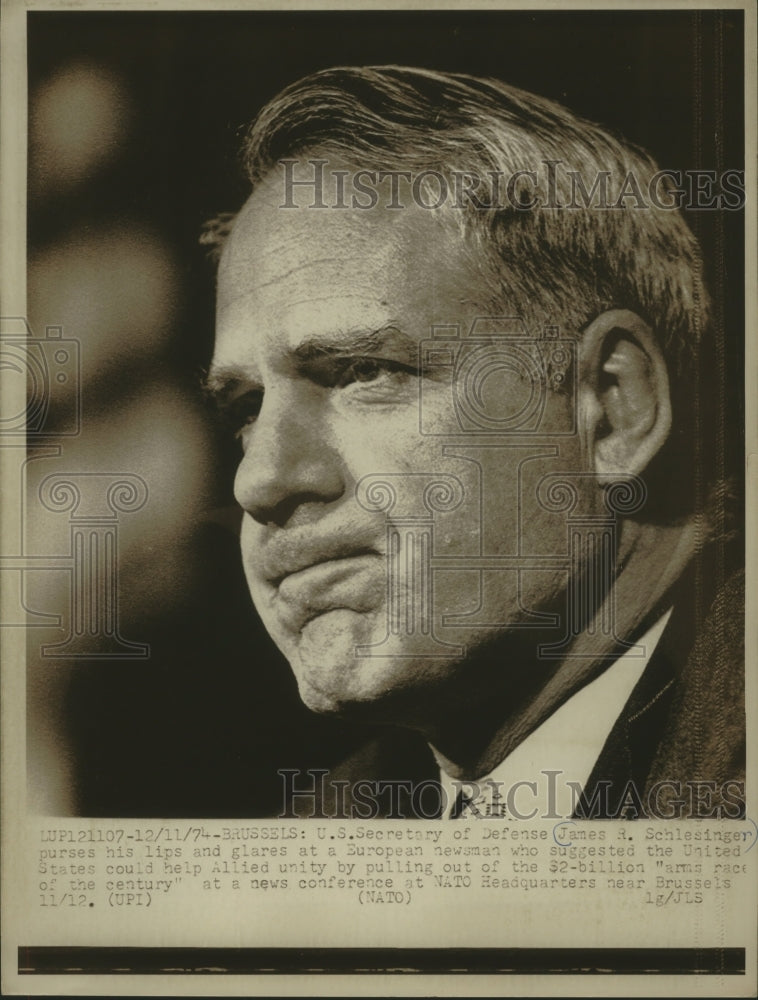 1974, James Schlesinger, news conference NATO headquarters, Brussels. - Historic Images